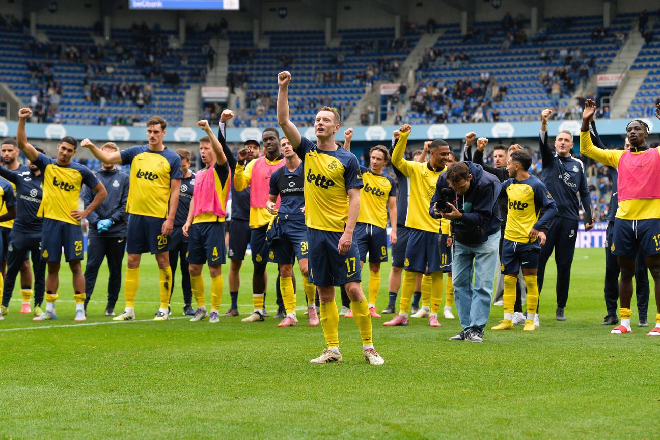Union's players celebrate after winning a soccer match between KRC Genk and Royale Union Saint-Gilloise, Sunday 21 September 2025 in Genk, a game of day 8 of the 2025-2026 'Jupiler Pro League' first division of the Belgian championship. BELGA PHOTO JILL D