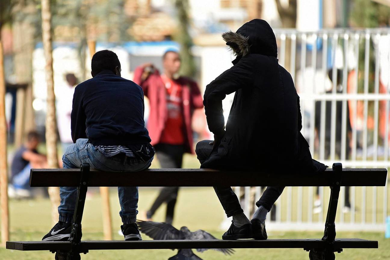 Transmigranten in het Maximiliaanpark