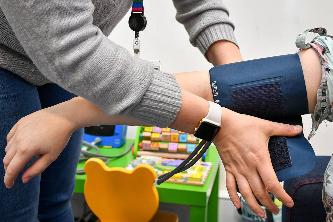 Huisdokter bloeddruk gezondheid huisarts medisch onderzoek