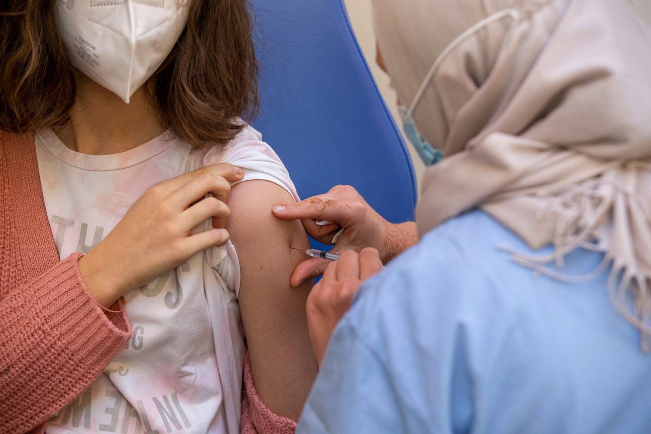 Woensdag 22 december 2021 in het vaccinatiecentrum Pacheco: kinderen vanaf 5 jaar kunnen nu ook een Pfizer-vaccin in lagere dosis krijgen als bescherming tegen het coronavirus