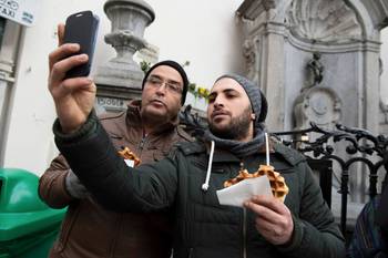 Een selfie met Manneken Pis en een Brusselse wafel in 2014
