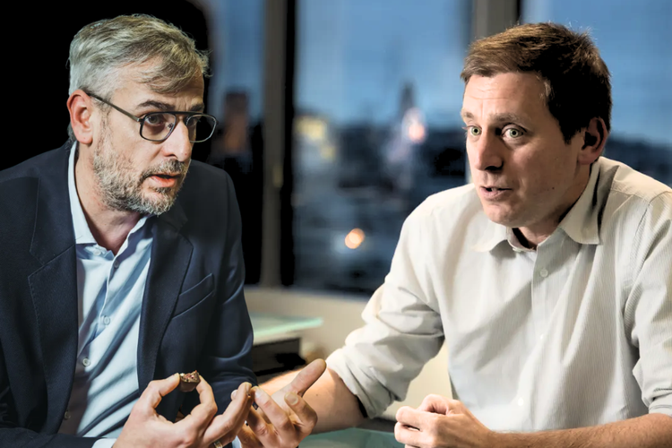 De foto toont twee ministers: De Smedt en Hublet.
