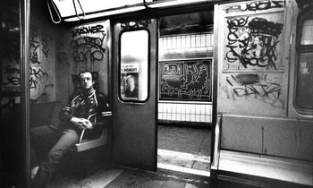 Keith Haring in a subway car in New York, circa 1983.
