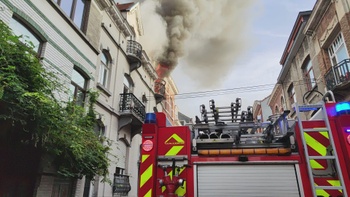 Brand woning Laken