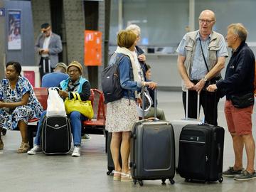 Reizigers in het Zuidstation.