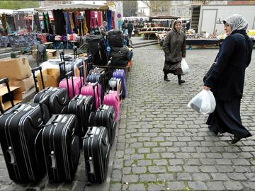 Sint-Jans-Molenbeek hoofddoek markt allochtone gemeenschap koffers