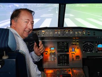 Ex-piloot Alain Loiseau sleepte een oud passagiersvliegtuig naar de Europese wijk om bedrijfseventsen en tête-à-têtes te organiseren