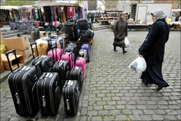 Sint-Jans-Molenbeek hoofddoek markt allochtone gemeenschap koffers